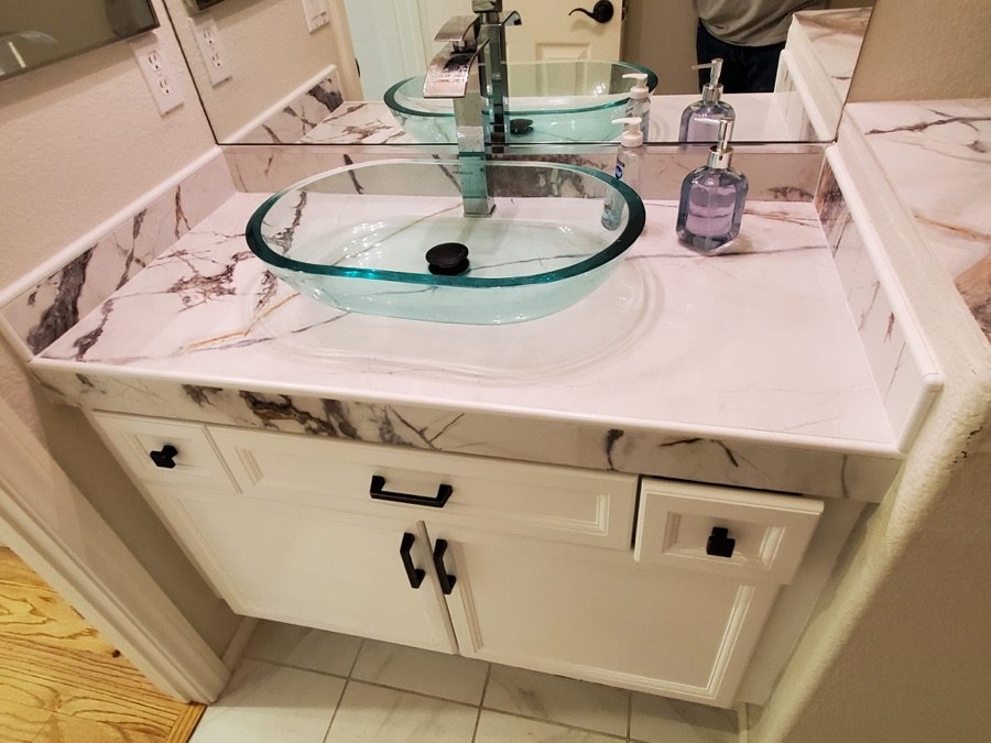 Custom vanity with glass bowl sink